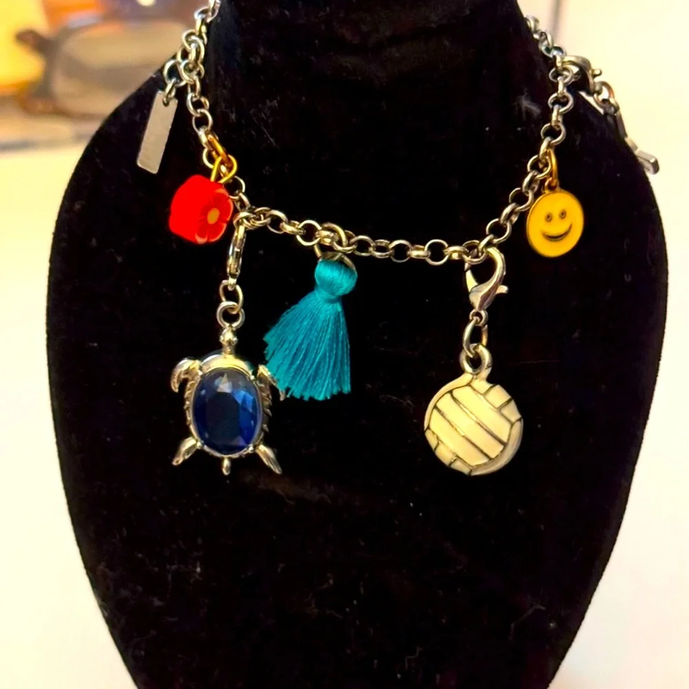 Wander Silver Tone Charm Bracelet